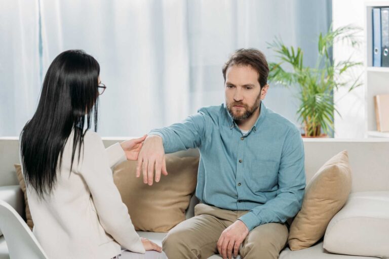 a hypnotherapist conducting hypnosis for pain relief
